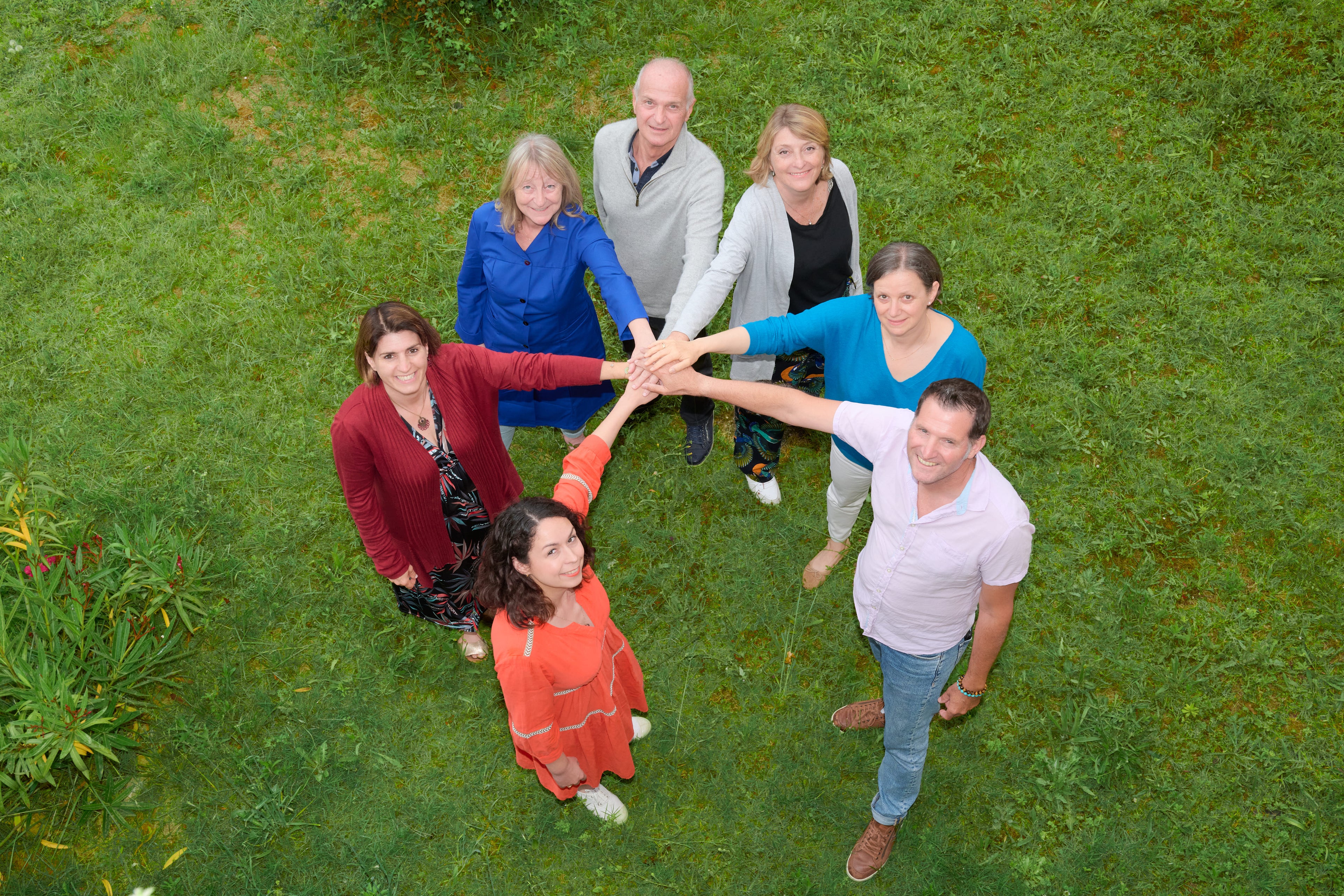 equipe cercle main